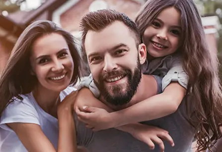 Foster mom and dad with foster daughter