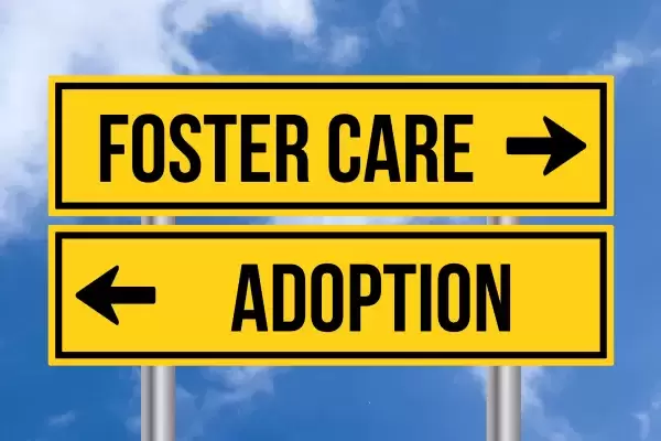 Double Signs Showing Foster Care and Adoption Opposite Directions