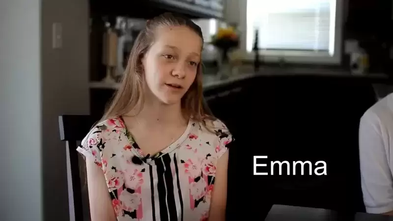 teenager being interviewed in living room