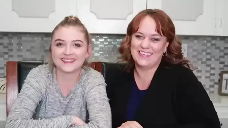 foster mum and daughter sitting together 