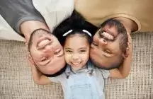 2 foster dads with foster child