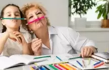 foster mom and child playing with art supplies