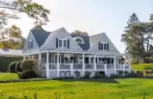 A White 2 story foster home in country