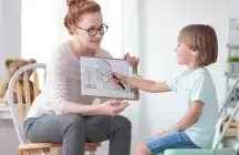 foster mom painting with a child 