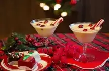 Two cocktails on a red table cloth