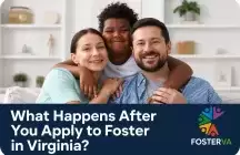 Foster family smiling together on a couch at home