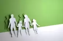 Folded Paper art origami. A father and mother with children crafted from paper
