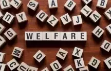 Welfare written in wood blocks